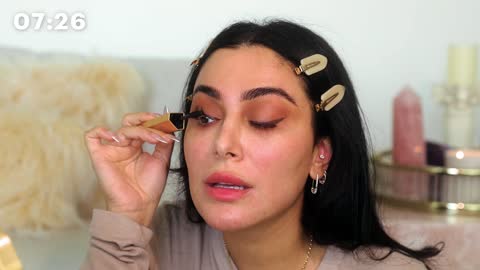 Huda Kattan's Everyday Glam Beauty Routine _ Allure (1)