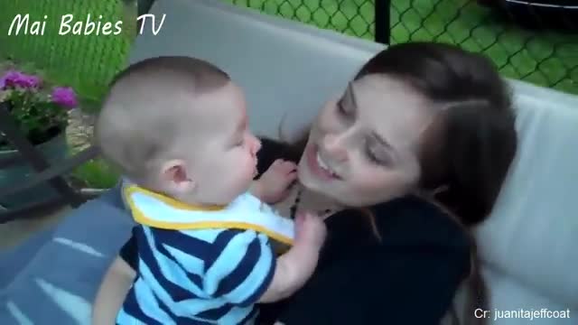 Cute Babies Kissing Mom