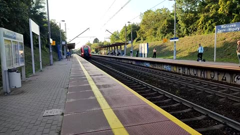 Train surfing in Warsaw on the airport line