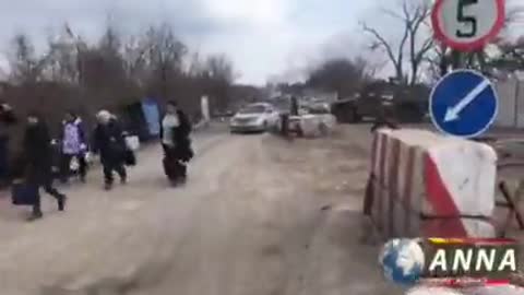 3 - Russian military and republican forces meet refugees in the northwest of Mariupol.