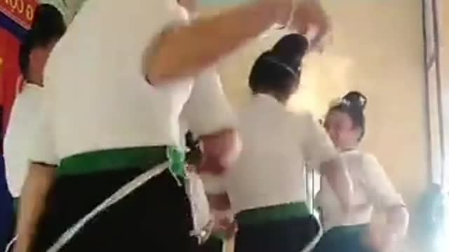 The sisters dance in the hall