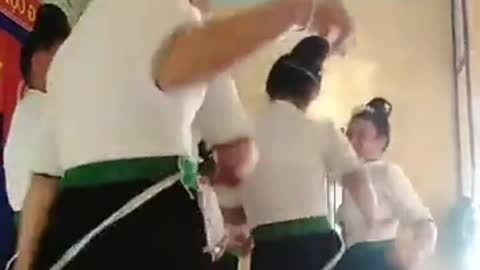 The sisters dance in the hall