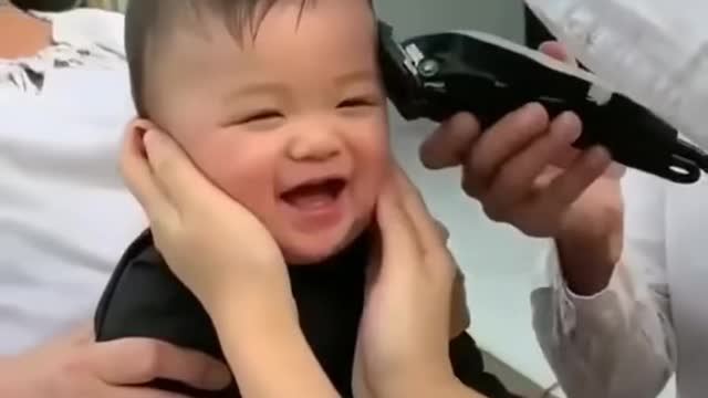 adorable baby getting his hair done