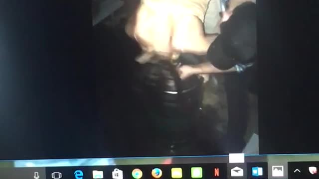 Girl drinking from keg and falling down