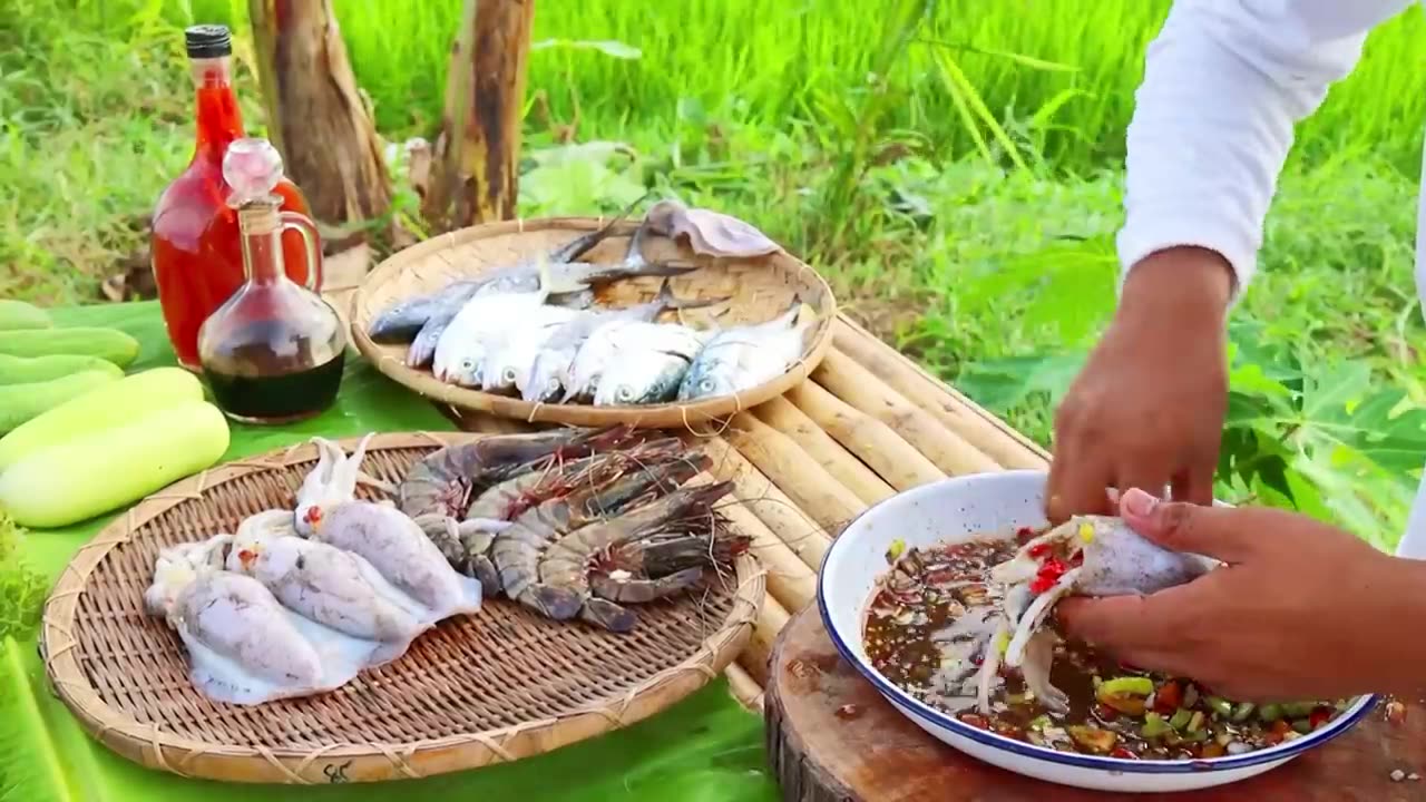 Grilling Seafoods in the Middle of Ricefields