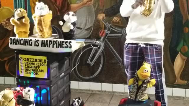 Dancing stuffed animals grooving with street performer in NYC