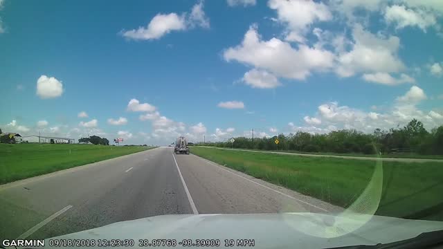 Driver Rear Ends Slow Moving Car