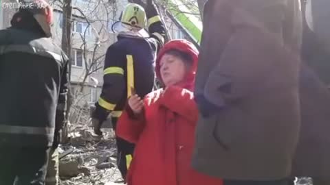 Shells hit near the firefighters during evacuation in Kharkiv ,Ukraine