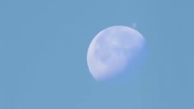Huge Planetary Object Filmed Above The Moon