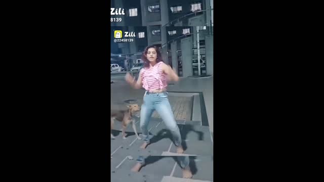 Dog didn't liked the girl dance and what happened try not to laugh