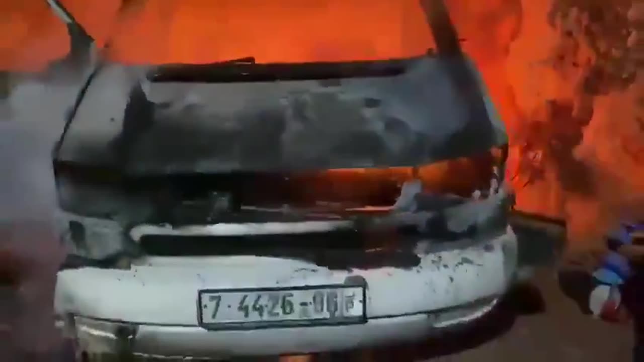 Israeli settlers set fire to Palestinian vehicles in the occupied West Bank