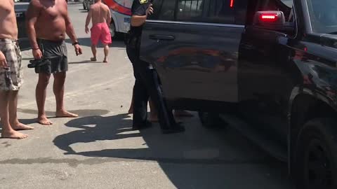 Man Arrested After Driving onto Packed Beach