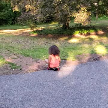 Child riding skateboard