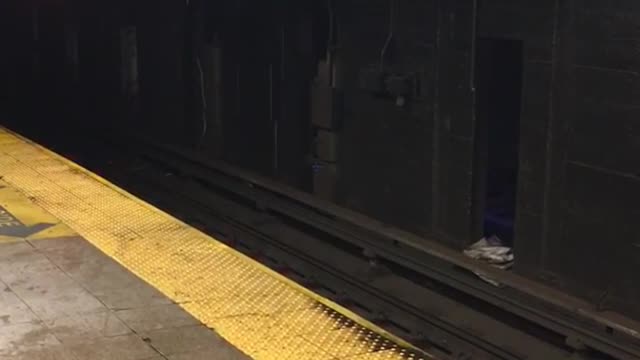 Water leaking into white bucket in subway