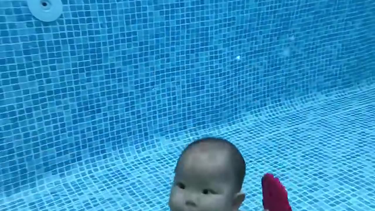 Cute Baby swimming in pool 🌞