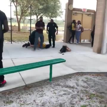Police Body Slams High School Girl