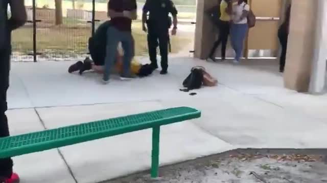 Police Body Slams High School Girl