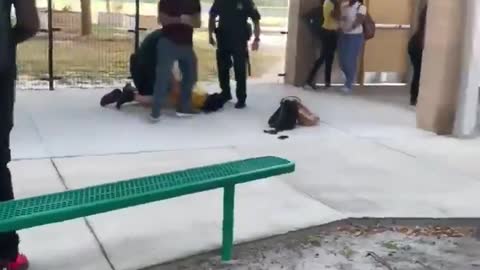 Police Body Slams High School Girl