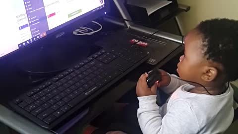 Baby with the computer