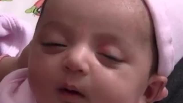 Cute baby' expression while sleeping... I think cutie is dreaming..