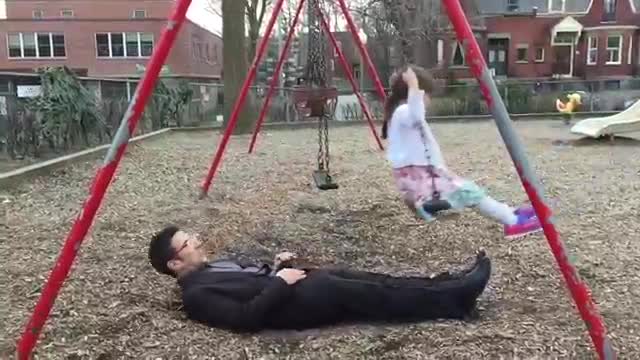 Awesome dad perfect swing in park