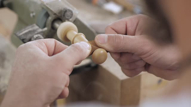 Carpenter Polishing One Piece Wood