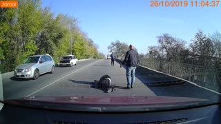 Man Falls Out of the Back of a Moving Van