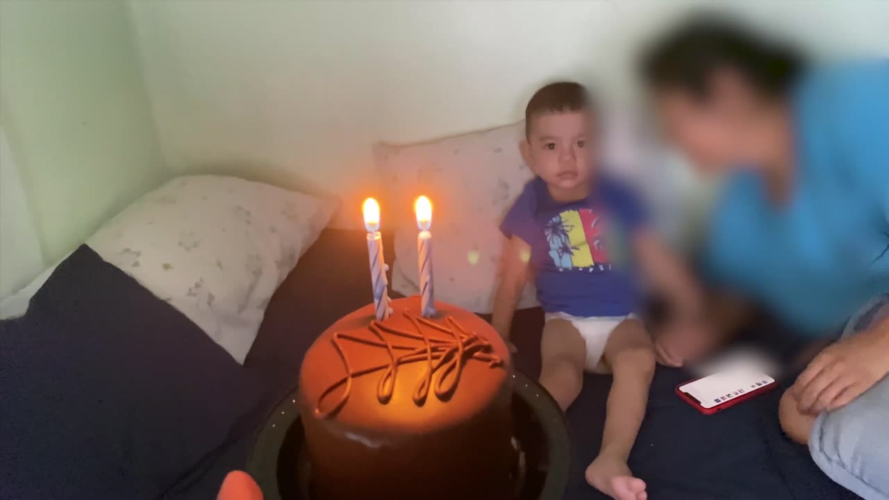 Boy Kicks Birthday Cake