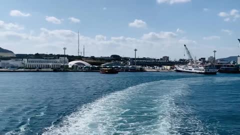 Video of us moving away from land on a boat.