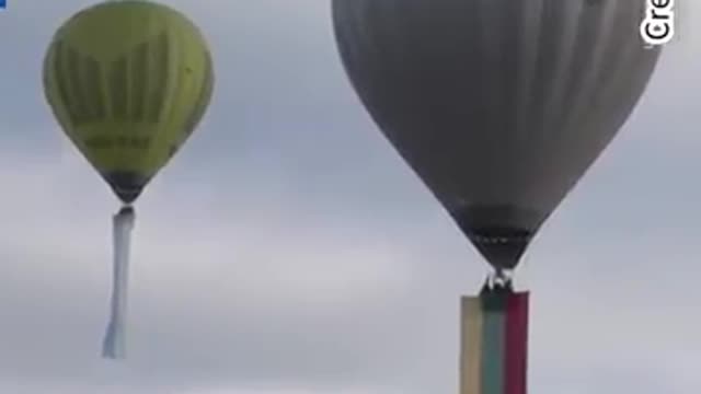 Ukraine flags fly from hot air balloons in Lithuania