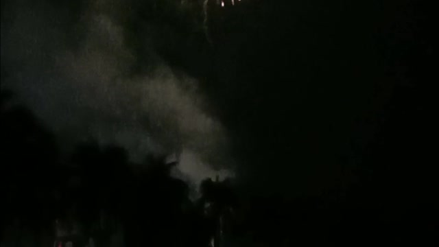 Fireworks explode in the sky