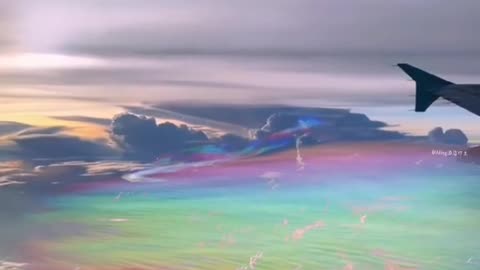 The first time I saw the colorful auspicious clouds on the plane