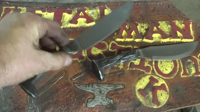 Forging two railroad spike knives