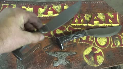 Forging two railroad spike knives