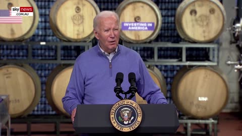 Joe Biden caught 'speaking a different language' and listening to barrel of beer