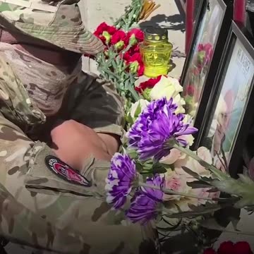 Wagner soldiers mourning Prigozhin near the Novosibirsk office in Russia