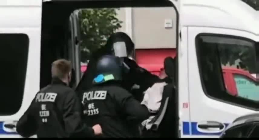 Gemany - Berlin. Police beat up and force man to wear mask