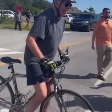 3rd angle close up: President Biden Falls off of his bike