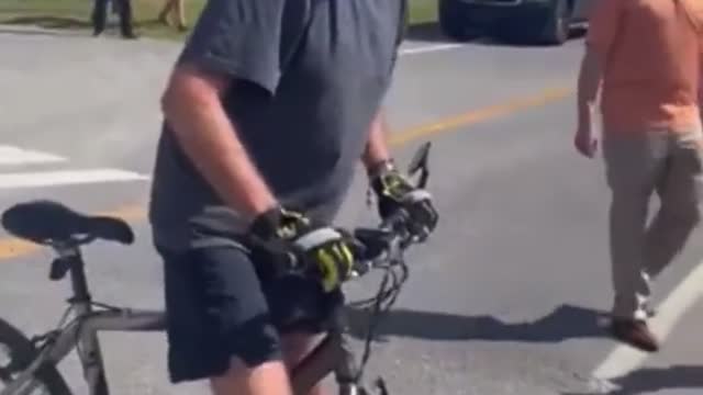 3rd angle close up: President Biden Falls off of his bike