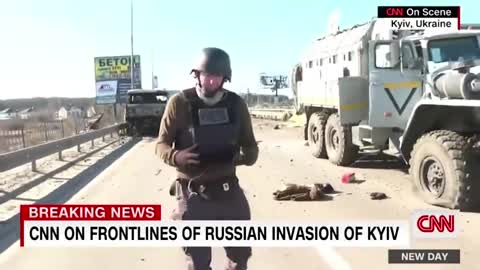 CNN reporter discovers he is crouching by grenade while on air