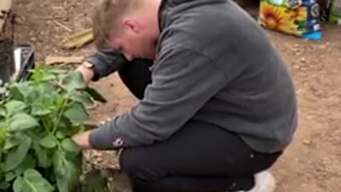 Cat wraps her arms around her dad's neck to hug him