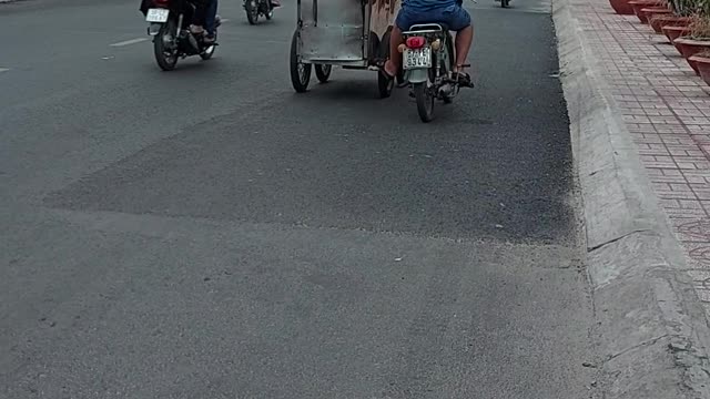 driving while driving a two-wheel vehicle while operating another vehicle