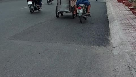 driving while driving a two-wheel vehicle while operating another vehicle