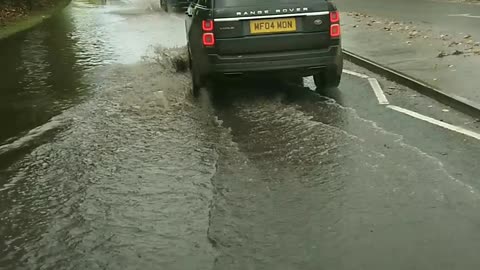 Flooded Road just after heavy rain Swindon England UK 31st October 2021