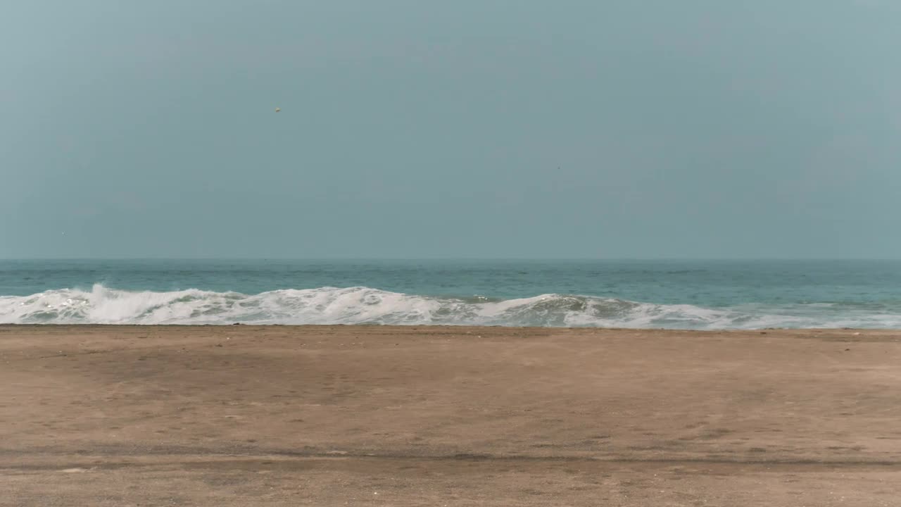 Waves at an empty beach