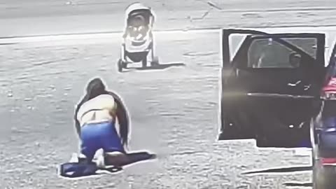 Good Samaritan rescues baby in stroller from rolling into busy street #Shorts