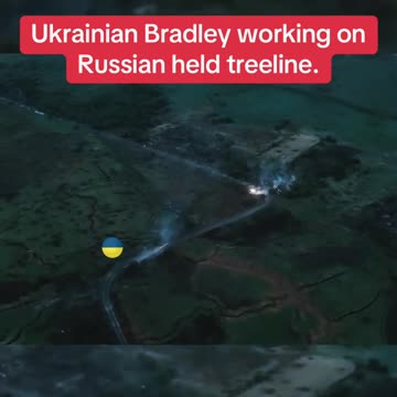Ukrainian Bradley Fighting Vehicle in Action Against Russian Defensive Line