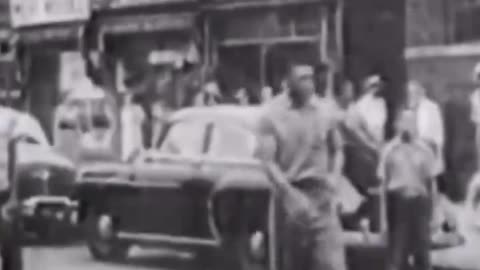 Willie Mays playing stickball in the streets of NYC