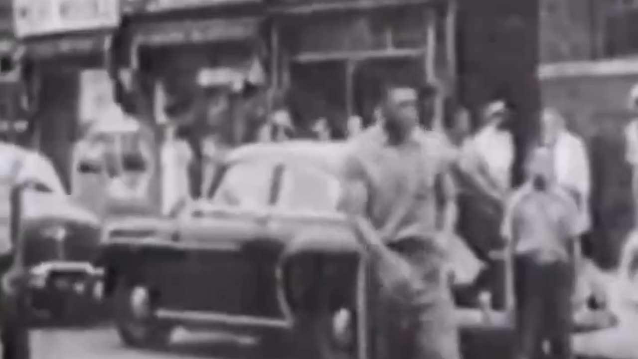 Willie Mays playing stickball in the streets of NYC