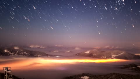 Impressive meteor shower seen from a mountain